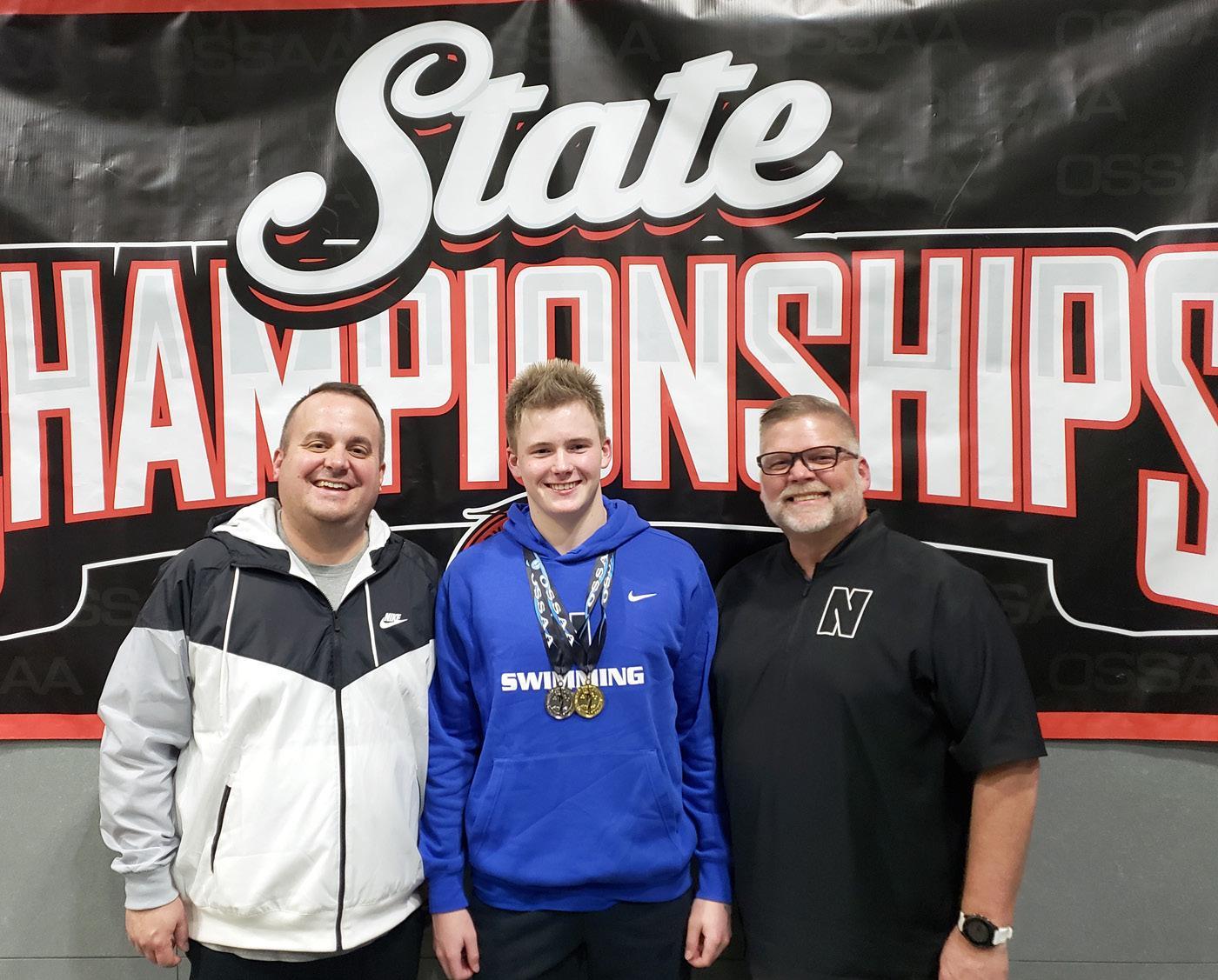 • photos by Jennifer Lewis Connor Leader, a sophomore at Newcastle High School and the only swimmer for NHS, was named State Champion after the Oklahoma Secondary School Athletic Association Class 5A 100m butterfly at the Jenks Aquatic Center Thursday a