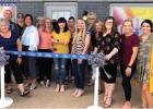Photo provided/For The Newcastle Pacer The Newcastle Chamber of Commerce rolled out the blue ribbon for the owners of The Smoothie Lounge to cut. The special event was held Thursday, Sept. 12 at their location off of Main Street.