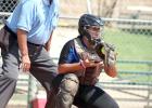 Catcher Lilyana Portillo surveys the field after a pitch during this weekend’s Lincoln-Christian